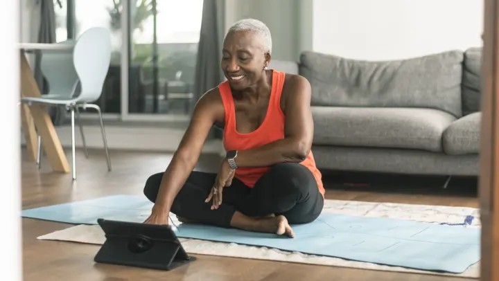 elderly woman doing yoga